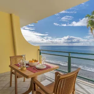 https://tranquil-beach-side-stayyour-seaside-escape.madeira-islandshotels.com